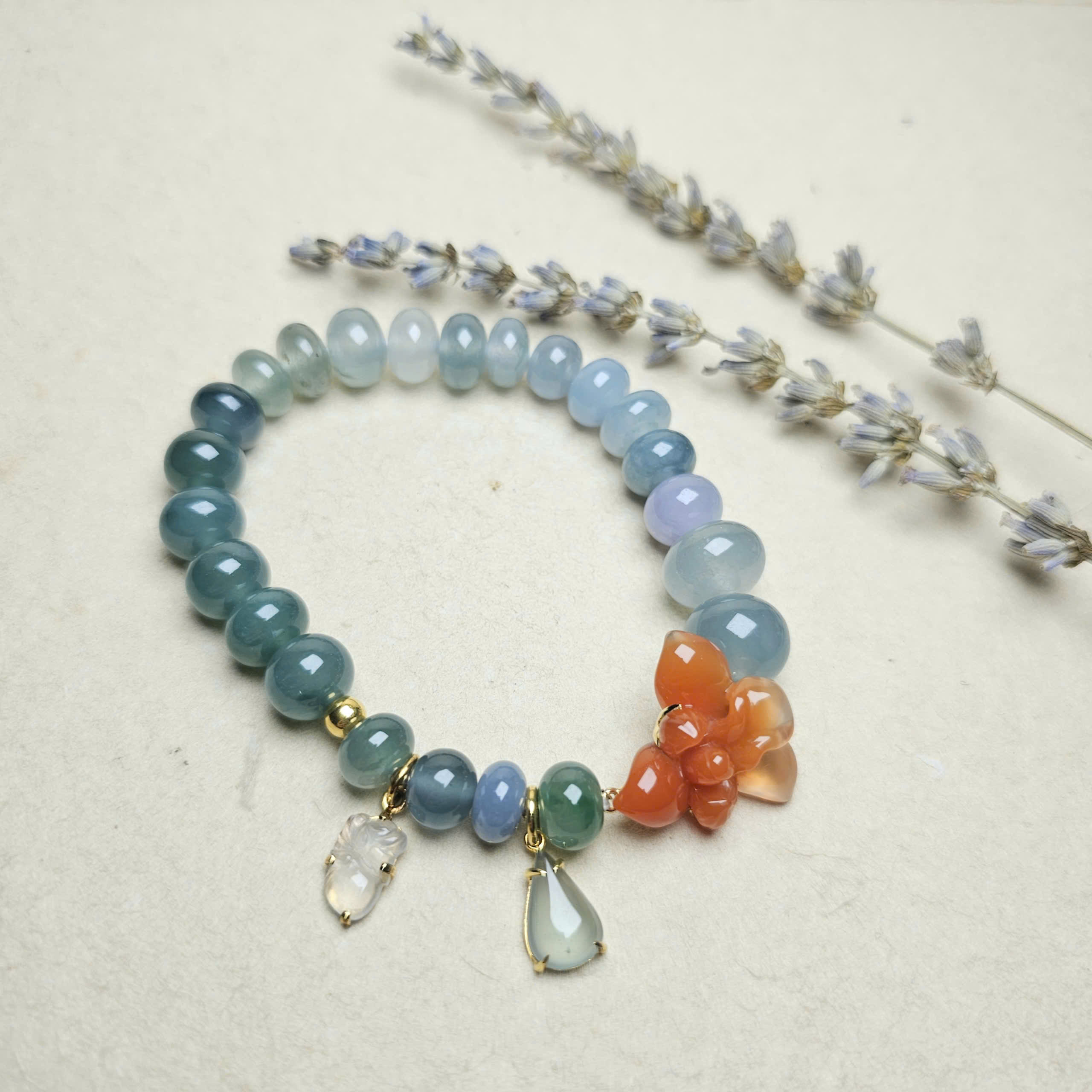 Vòng ngọc phỉ thúy đa sắc mix charm hoa lan Nam Hồng Bảo Sơn